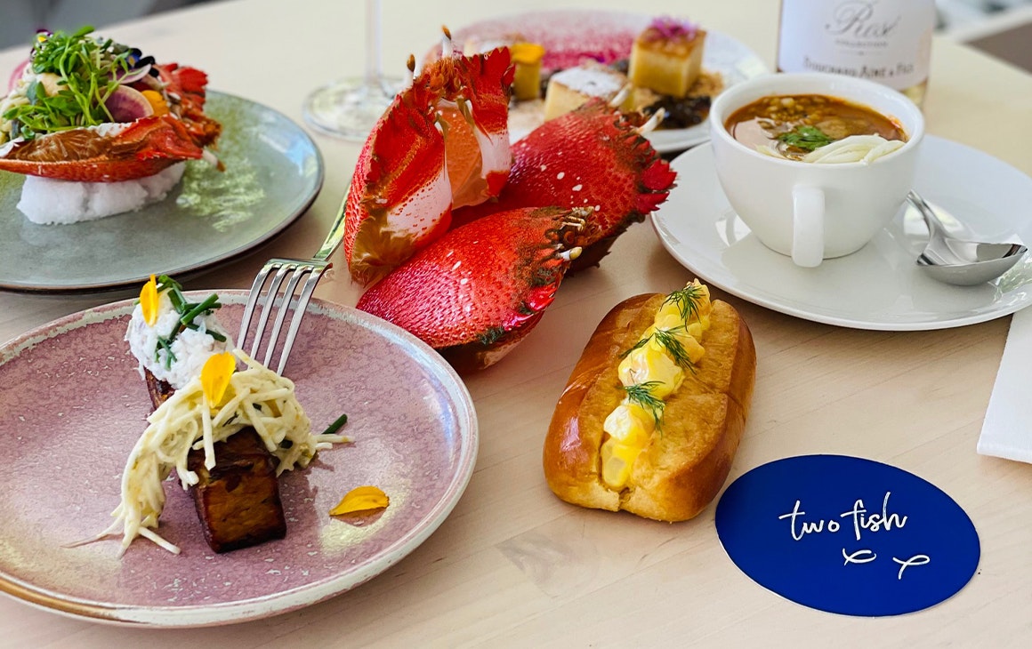 a table spread with seafood dishes